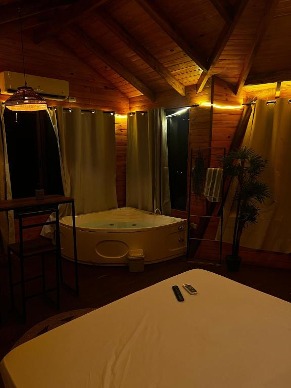 Postel nebo postele na pokoji v ubytování Cabañas Resort