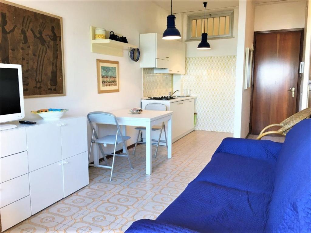 A kitchen or kitchenette at Nice apartment in Porto Santa Margherita with terrace