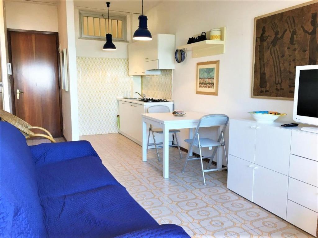 A kitchen or kitchenette at Nice apartment in Porto Santa Margherita with terrace