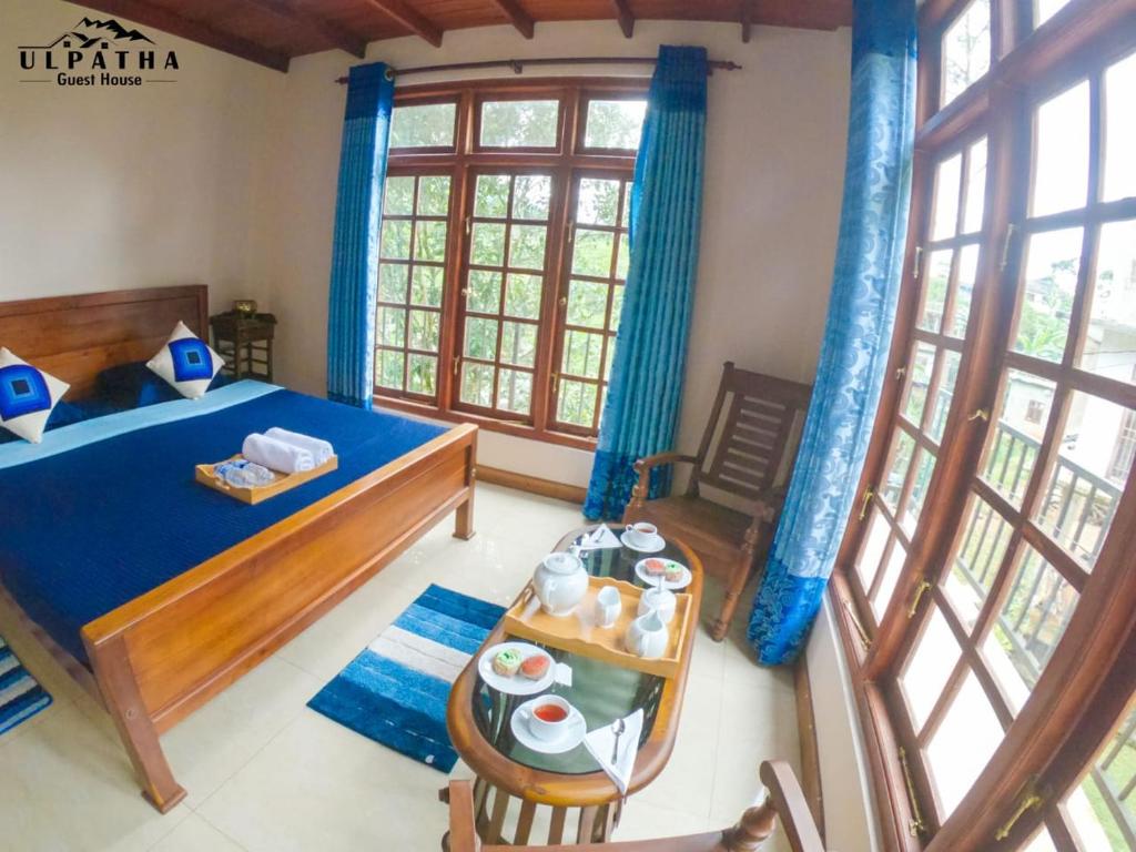 Postel nebo postele na pokoji v ubytování Ulpatha Guest House