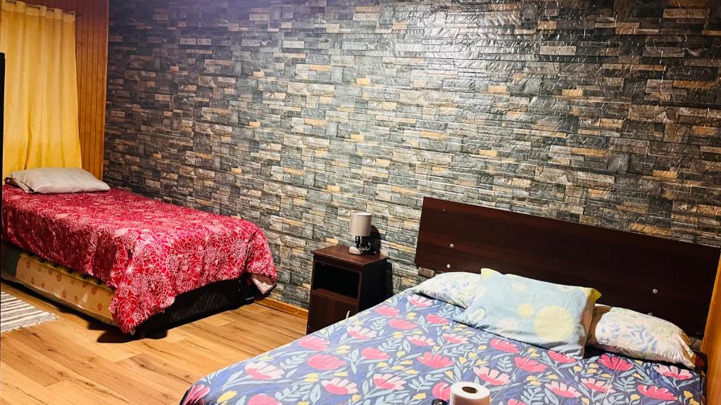 Postel nebo postele na pokoji v ubytování Hostal Santa Fe