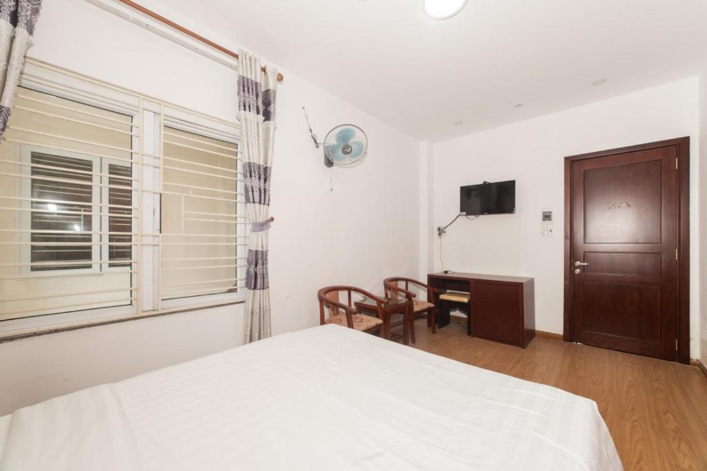 Postel nebo postele na pokoji v ubytování Kis Hotel & Apartment