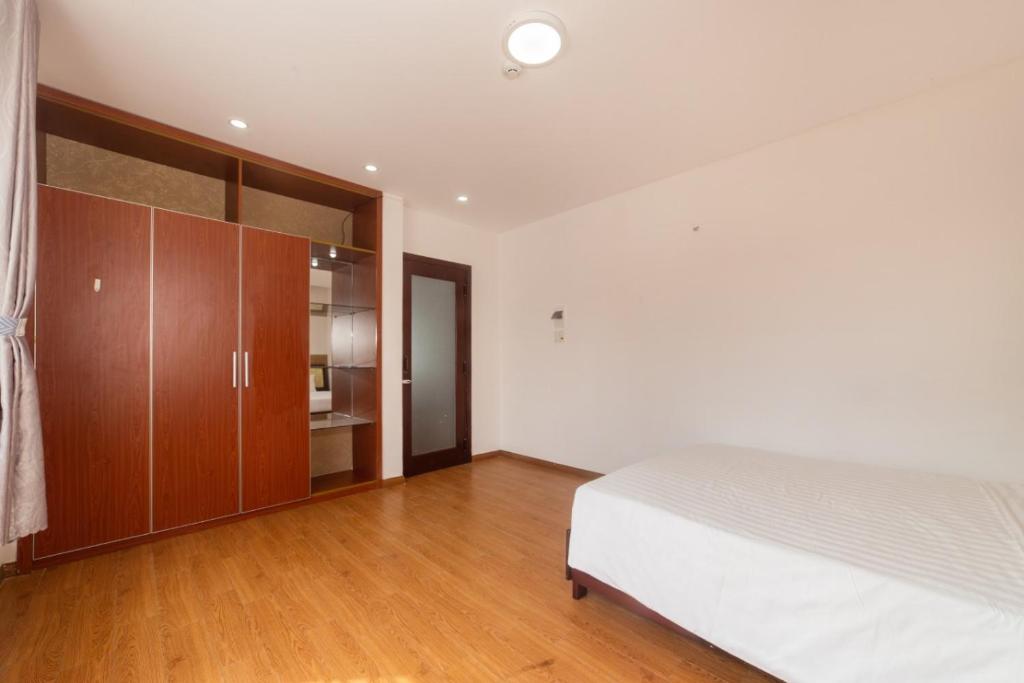 Postel nebo postele na pokoji v ubytování Kis Hotel & Apartment