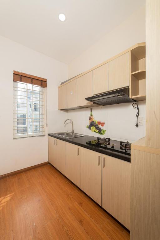 Kuchyň nebo kuchyňský kout v ubytování Kis Hotel & Apartment