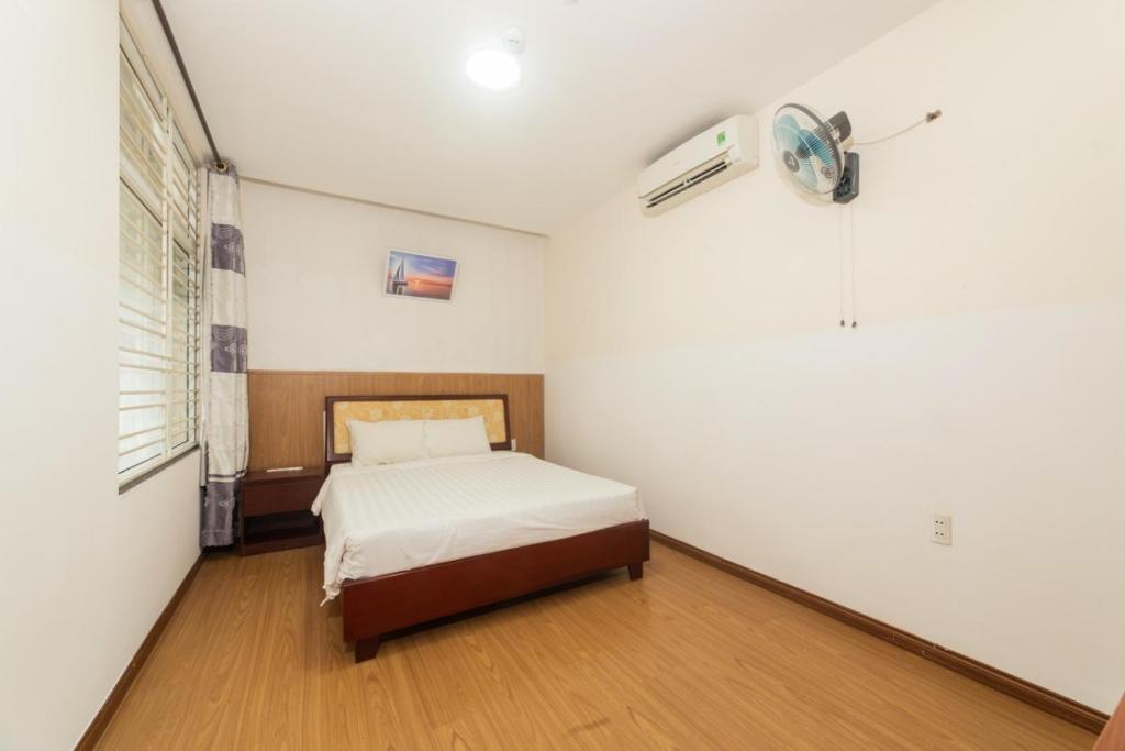 Postel nebo postele na pokoji v ubytování Kis Hotel & Apartment