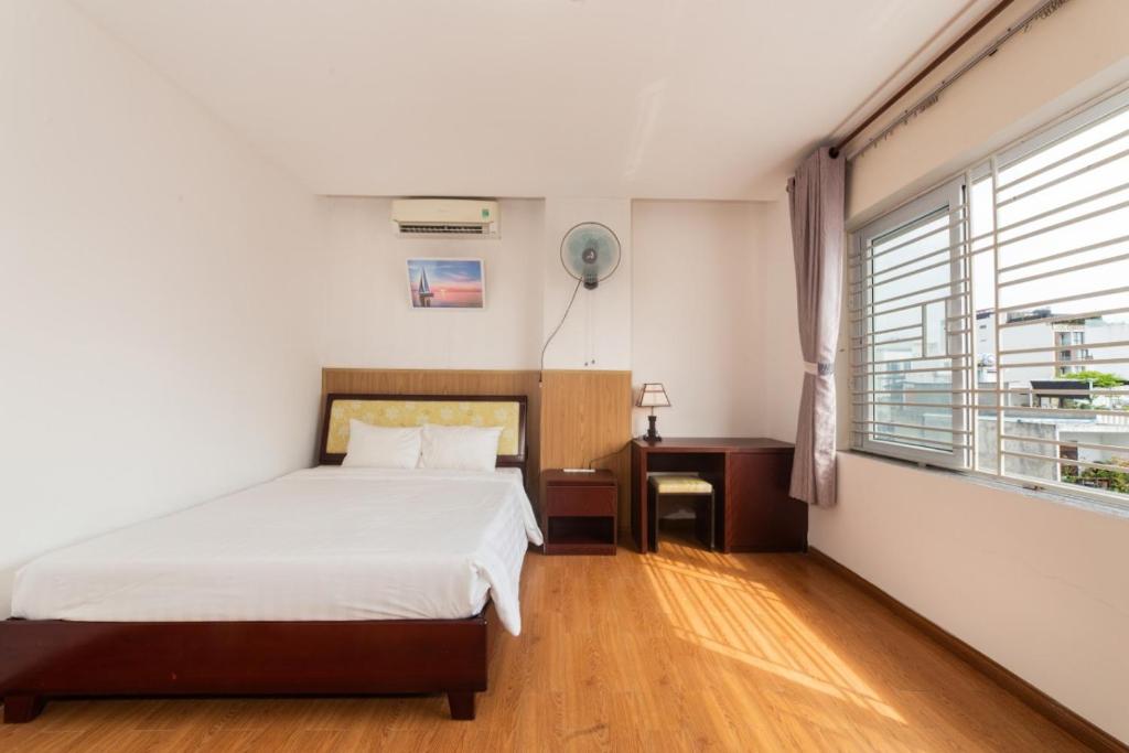 Postel nebo postele na pokoji v ubytování Kis Hotel & Apartment