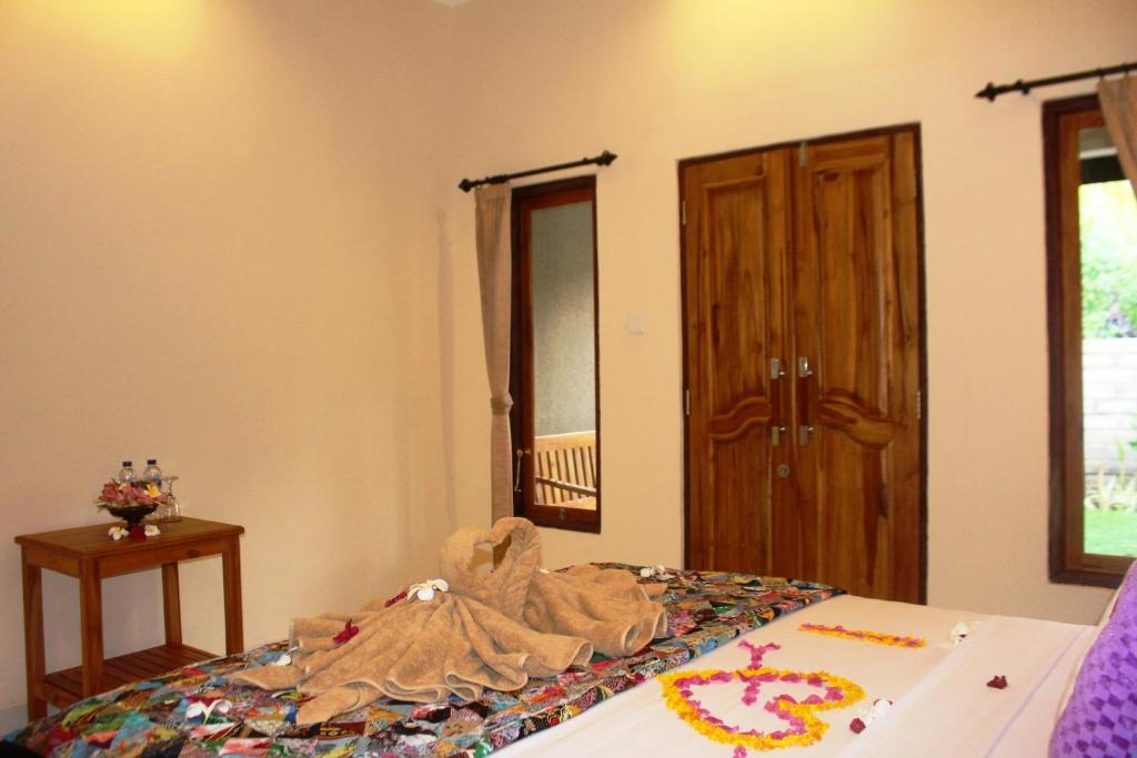Postel nebo postele na pokoji v ubytování Pande Guest House