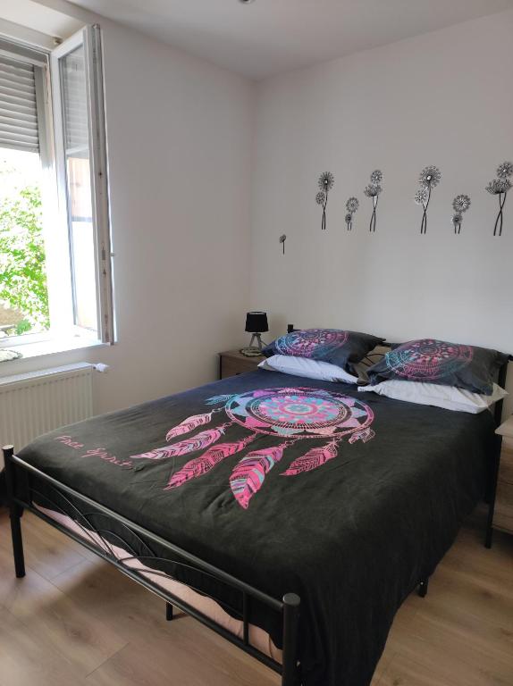 Postel nebo postele na pokoji v ubytování Chez Dori Chambre privée