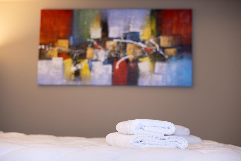 Postel nebo postele na pokoji v ubytování 4R Colombo Hotel