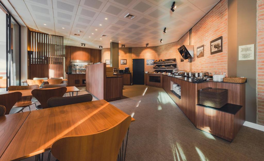 Kuchyň nebo kuchyňský kout v ubytování Studio-Hotel Apostroff