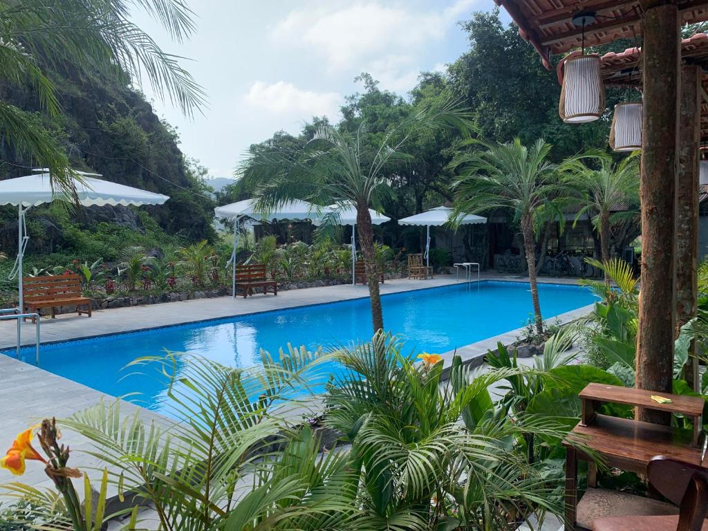 Πισίνα στο ή κοντά στο Trang An river mountain ecolodge Ninh Binh