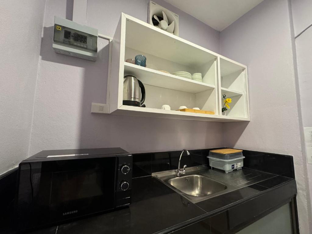 Kuchyň nebo kuchyňský kout v ubytování Pupa Rooms