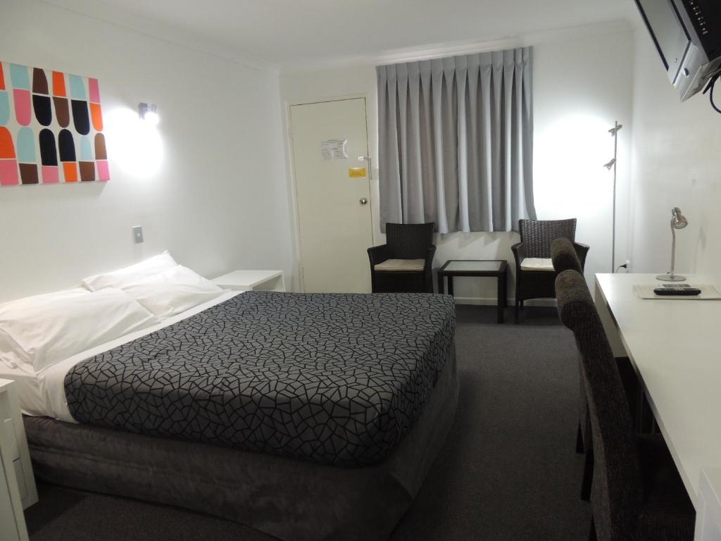 Postel nebo postele na pokoji v ubytování Park View Motel
