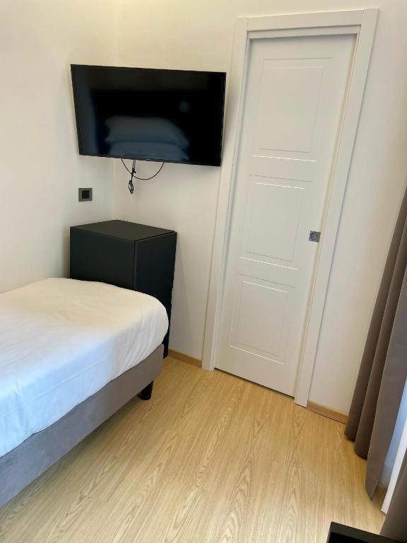 Postel nebo postele na pokoji v ubytování Hotel Patria