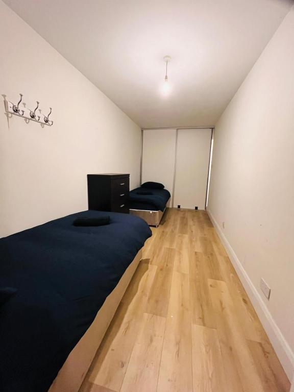 Postel nebo postele na pokoji v ubytování Flexible Spacious Quad ''4'' Room - 1