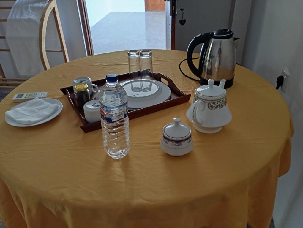Příslušenství pro přípravu čaje a kávy v ubytování Candela Garden