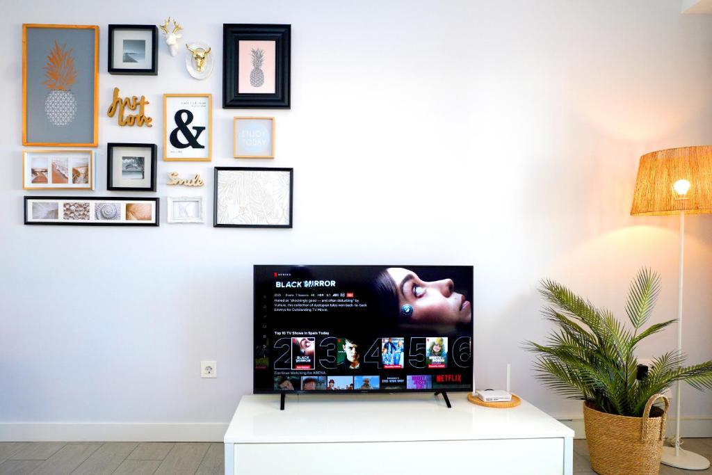 TV a/nebo společenská místnost v ubytování APARTAMENTO ARENA en Playa de San Juan