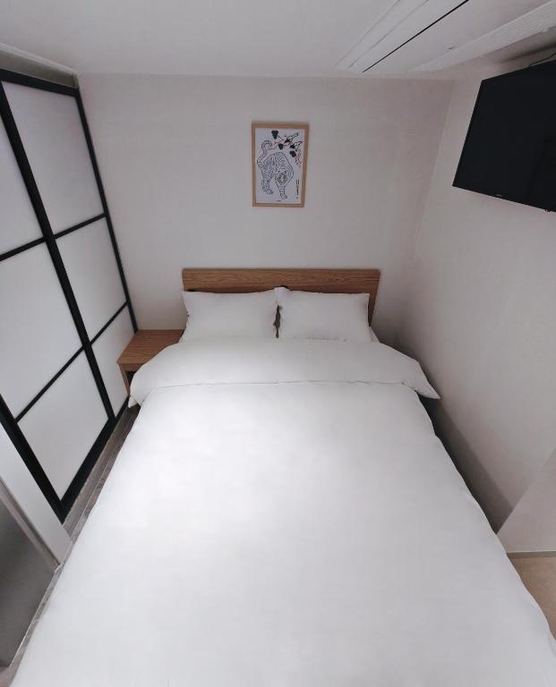 Postel nebo postele na pokoji v ubytování D Stay Hostel Dongdaemun
