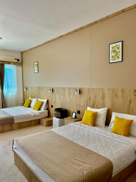 Postel nebo postele na pokoji v ubytování El Mar Hotel