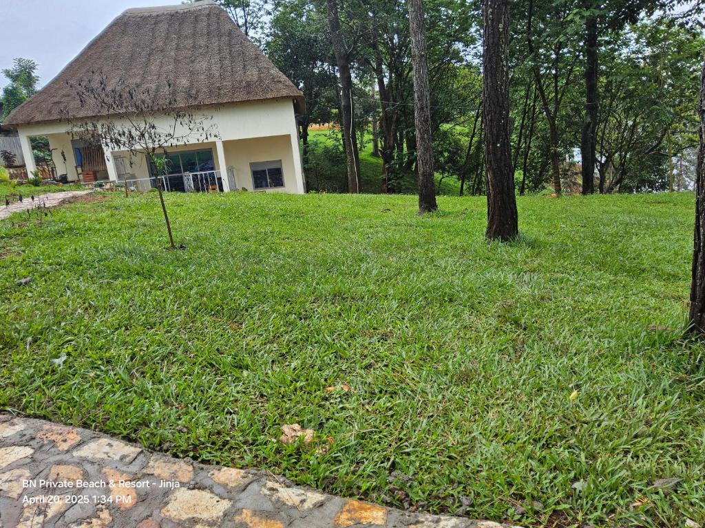Zahrada ubytování BN Private Beach & Resort - Jinja