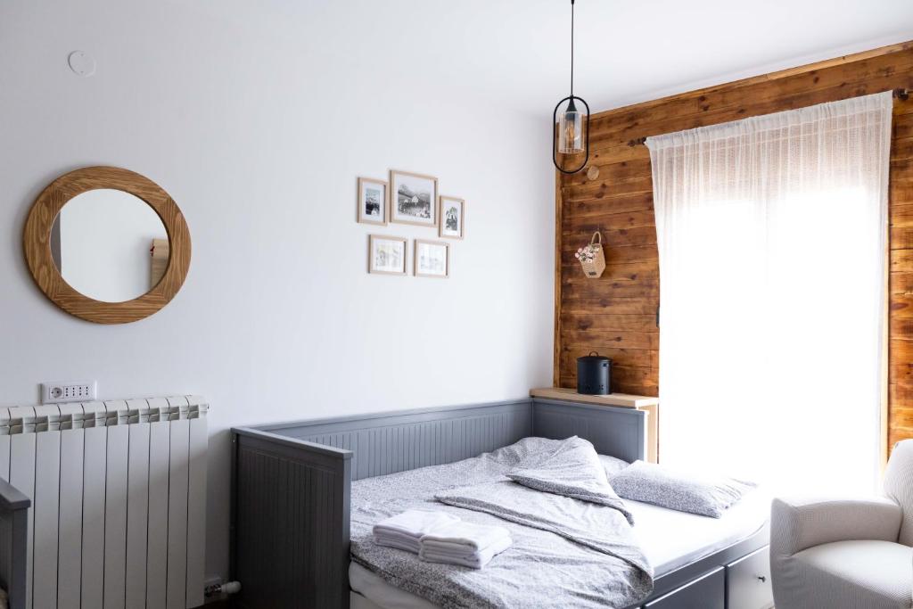 Postel nebo postele na pokoji v ubytování Apartmani 1490