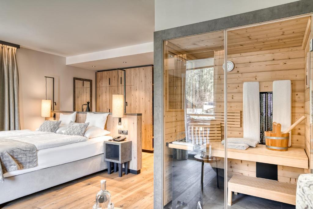 Postel nebo postele na pokoji v ubytování Hotel habicher hof 4-Sterne-Superior