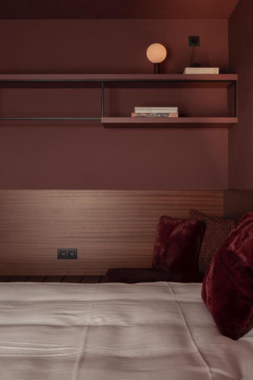 Postel nebo postele na pokoji v ubytování Hostellerie Kemmelberg