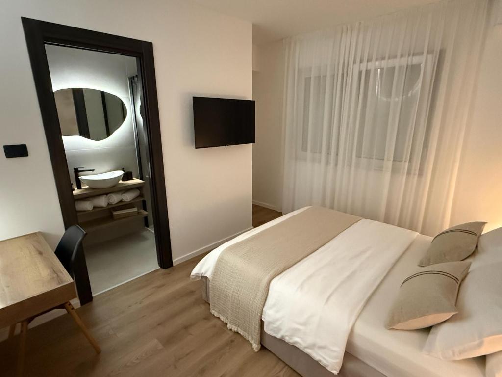 Postel nebo postele na pokoji v ubytování Villa Barbara