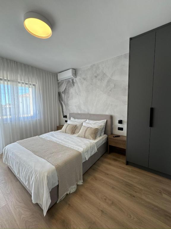 Postel nebo postele na pokoji v ubytování Villa Barbara