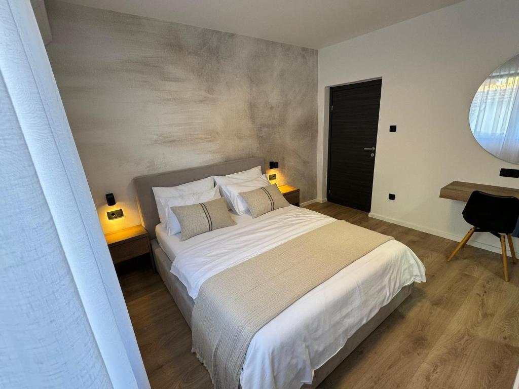 Postel nebo postele na pokoji v ubytování Villa Barbara
