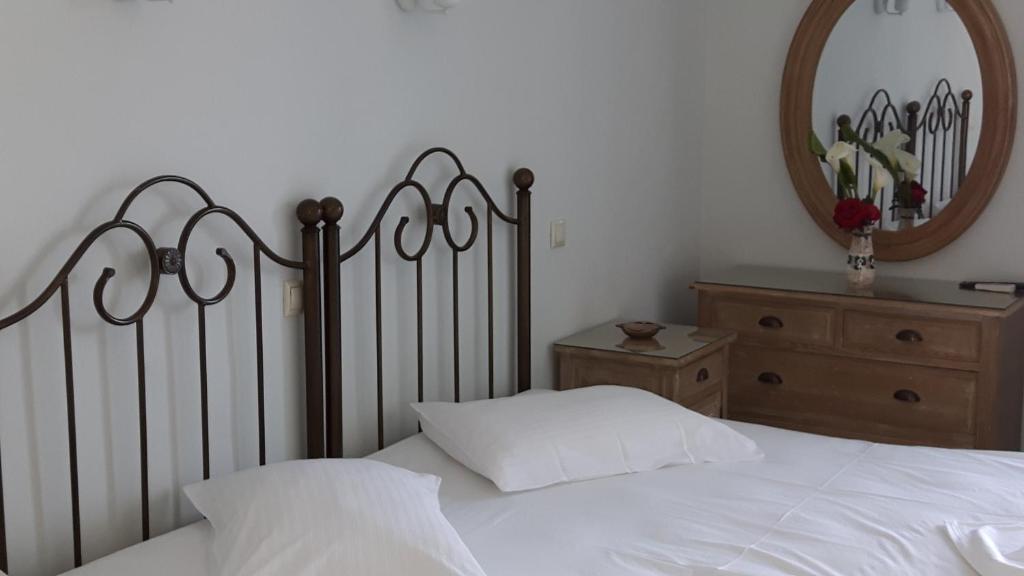 Postel nebo postele na pokoji v ubytování Minoa Hotel