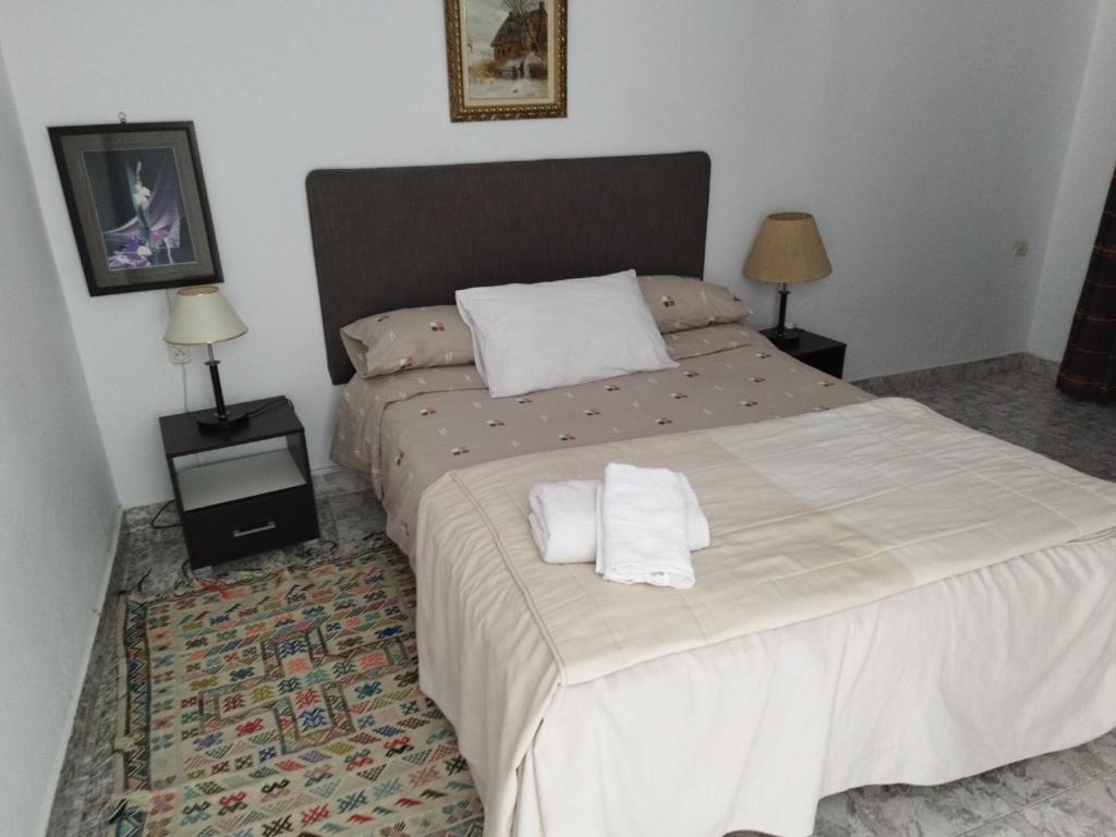 Postel nebo postele na pokoji v ubytování brisa medeterraneo 7