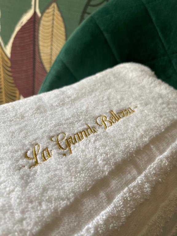 a white napkin with the words nienna grannium on it at La Grande Bellezza in Taranto