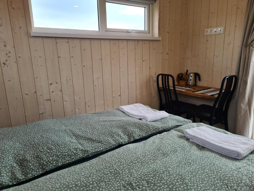 Voodi või voodid majutusasutuse Búhóll 1 Guesthouse toas