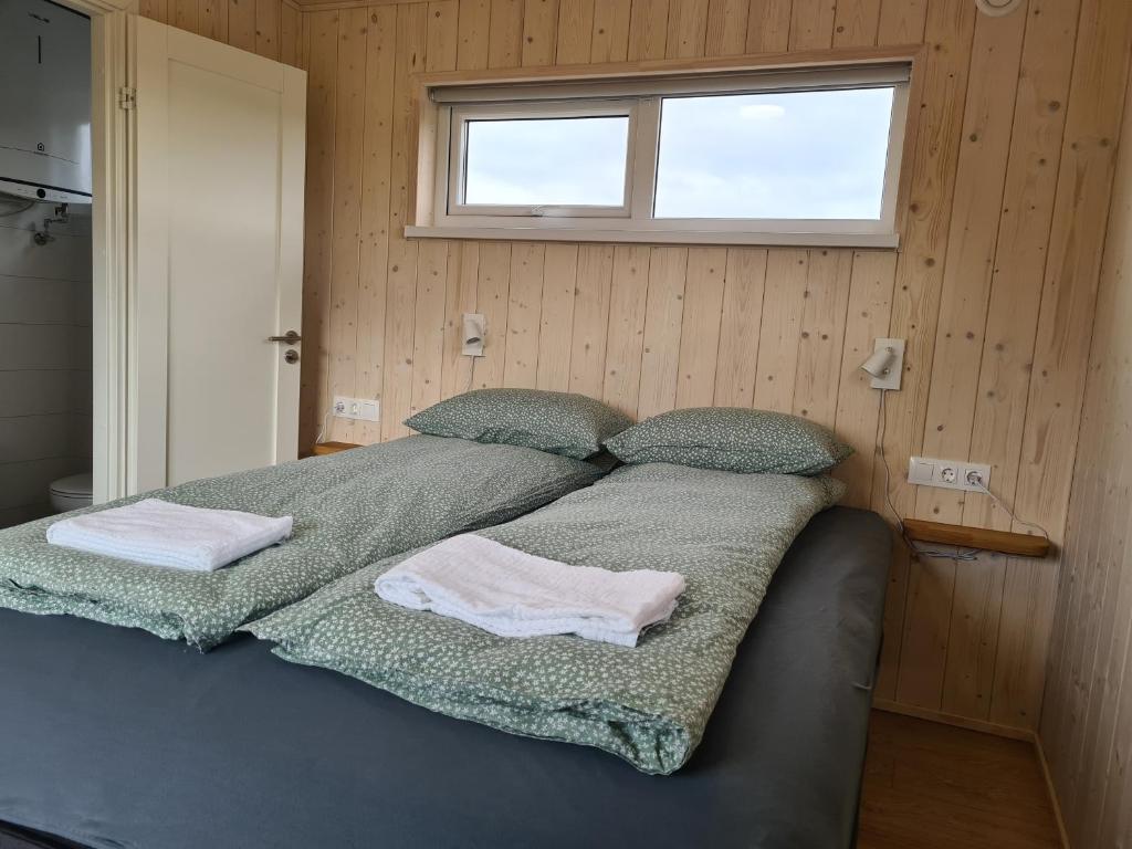 Voodi või voodid majutusasutuse Búhóll 1 Guesthouse toas