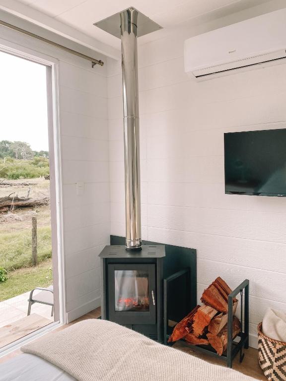 TV a/nebo společenská místnost v ubytování Casa de mar - José Ignacio