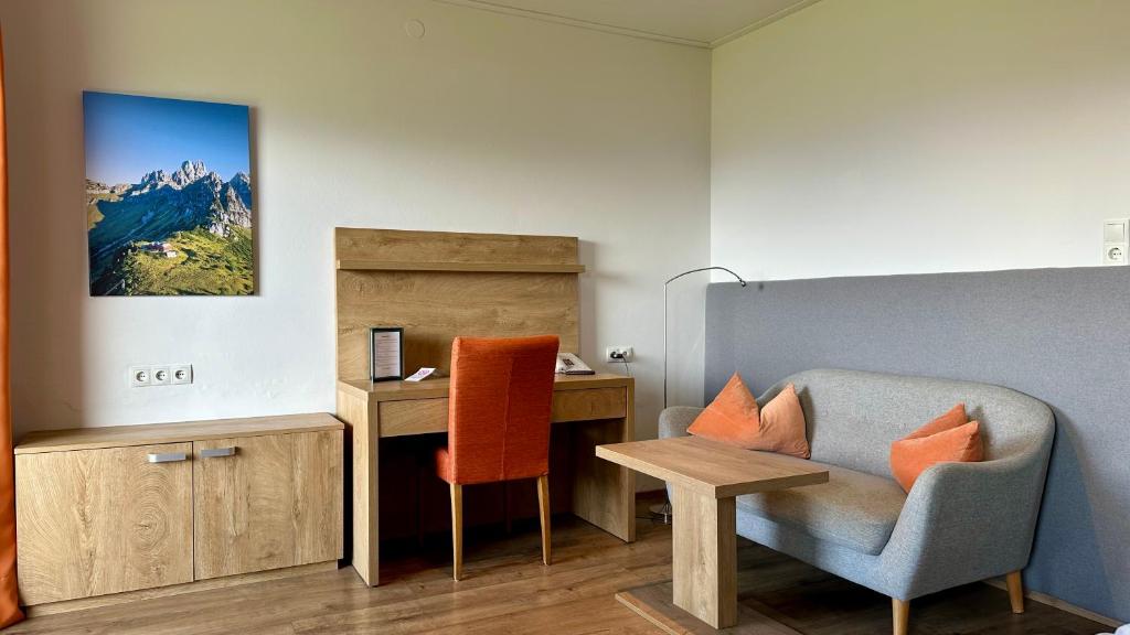 TV a/nebo společenská místnost v ubytování Hotel Schöne Aussicht