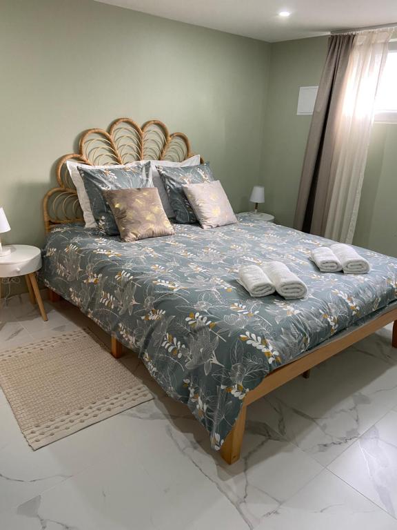 Postel nebo postele na pokoji v ubytování Appartement Cosy Le Lys Vert à 40mn de Paris