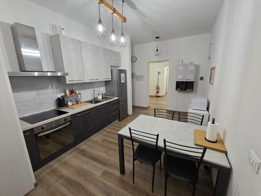 Kuchyň nebo kuchyňský kout v ubytování DA NI TO Rooms 1