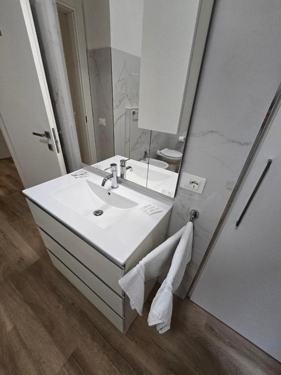 Koupelna v ubytování DA NI TO Rooms 1