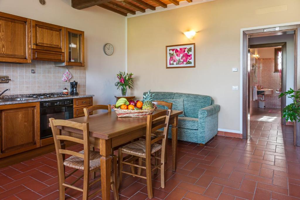 Kuchyň nebo kuchyňský kout v ubytování Corte Tommasi Residence