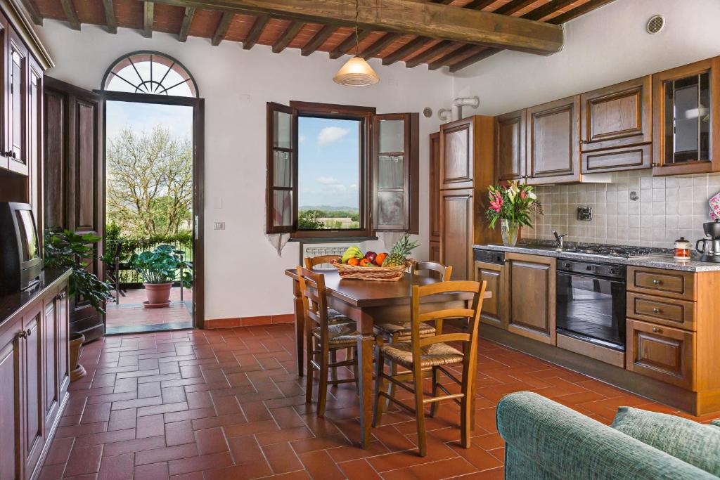 Kuchyň nebo kuchyňský kout v ubytování Corte Tommasi Residence