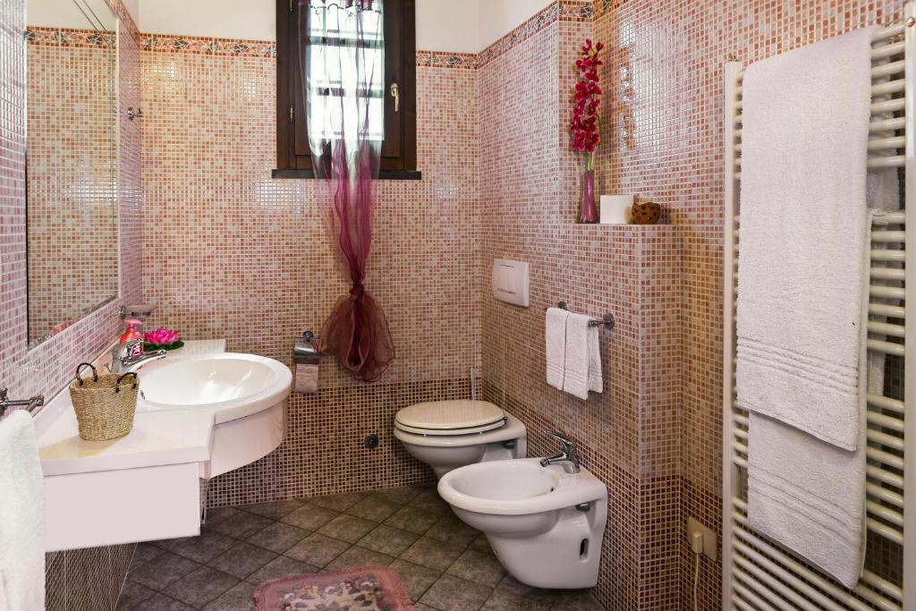Koupelna v ubytování Corte Tommasi Residence