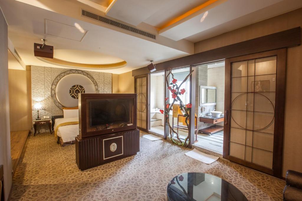 TV a/nebo společenská místnost v ubytování Spring Breeze Hotel