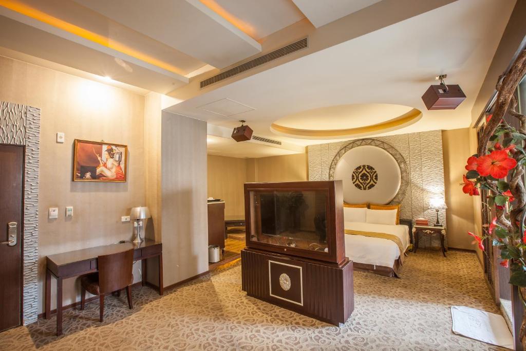 TV a/nebo společenská místnost v ubytování Spring Breeze Hotel