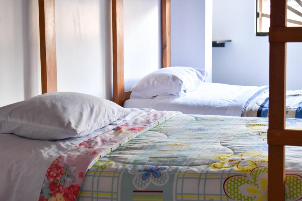 Postel nebo postele na pokoji v ubytování Tony Montaña B&B