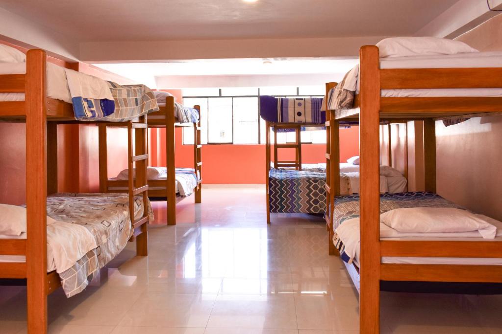 Postel nebo postele na pokoji v ubytování Tony Montaña B&B