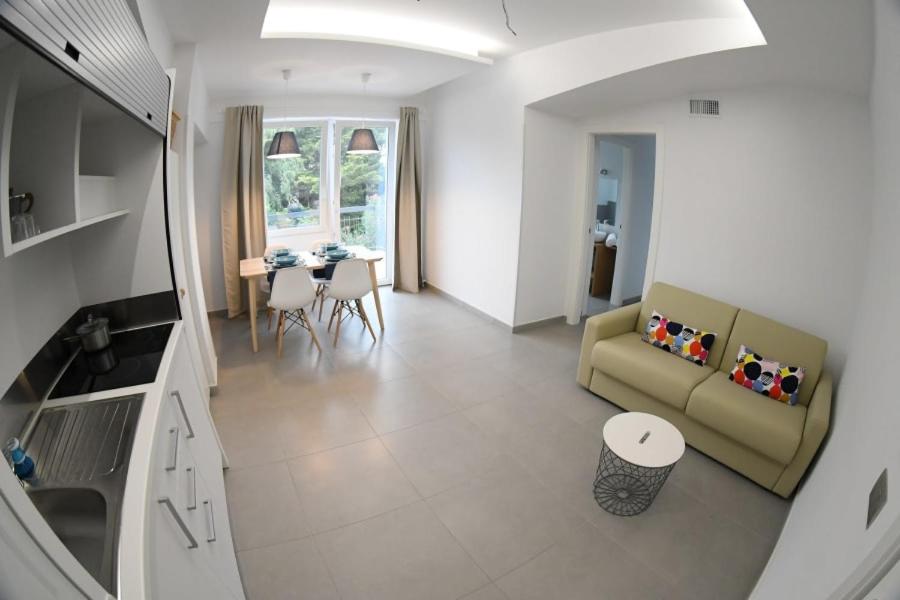 TV a/nebo společenská místnost v ubytování Golden Beach Residence