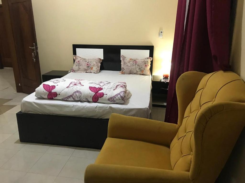 Llit o llits en una habitació de Chez Penda