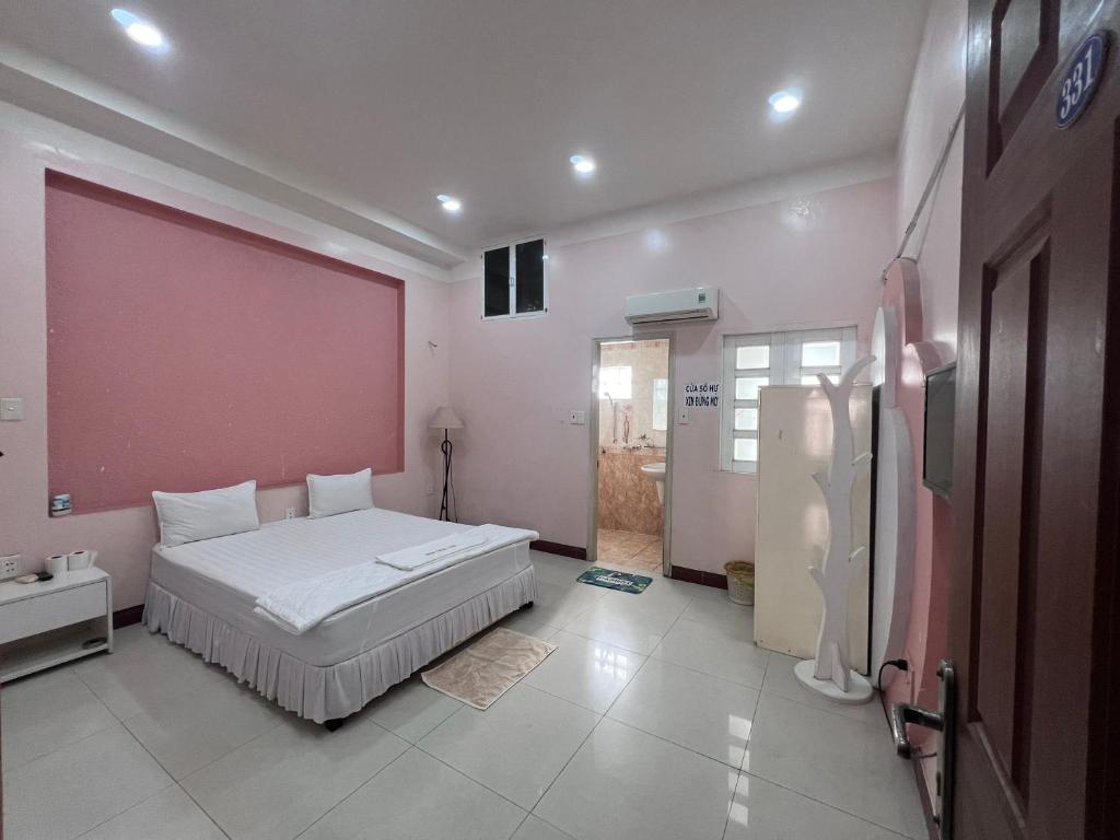 Postel nebo postele na pokoji v ubytování Hoa Mộc Trà Motel
